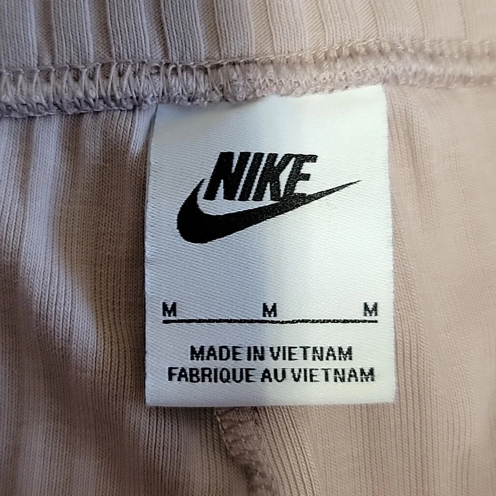 Nike Size M Creamy Beige Chill Knit Mid Rise Ribbed Flare Leg Pants
